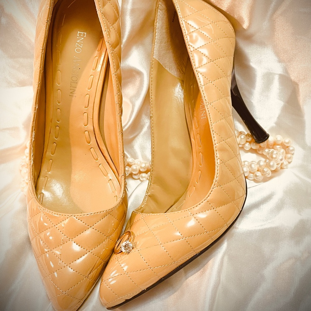 Enzo Angiolini- Nude quilted patent leather pumps with black heel.